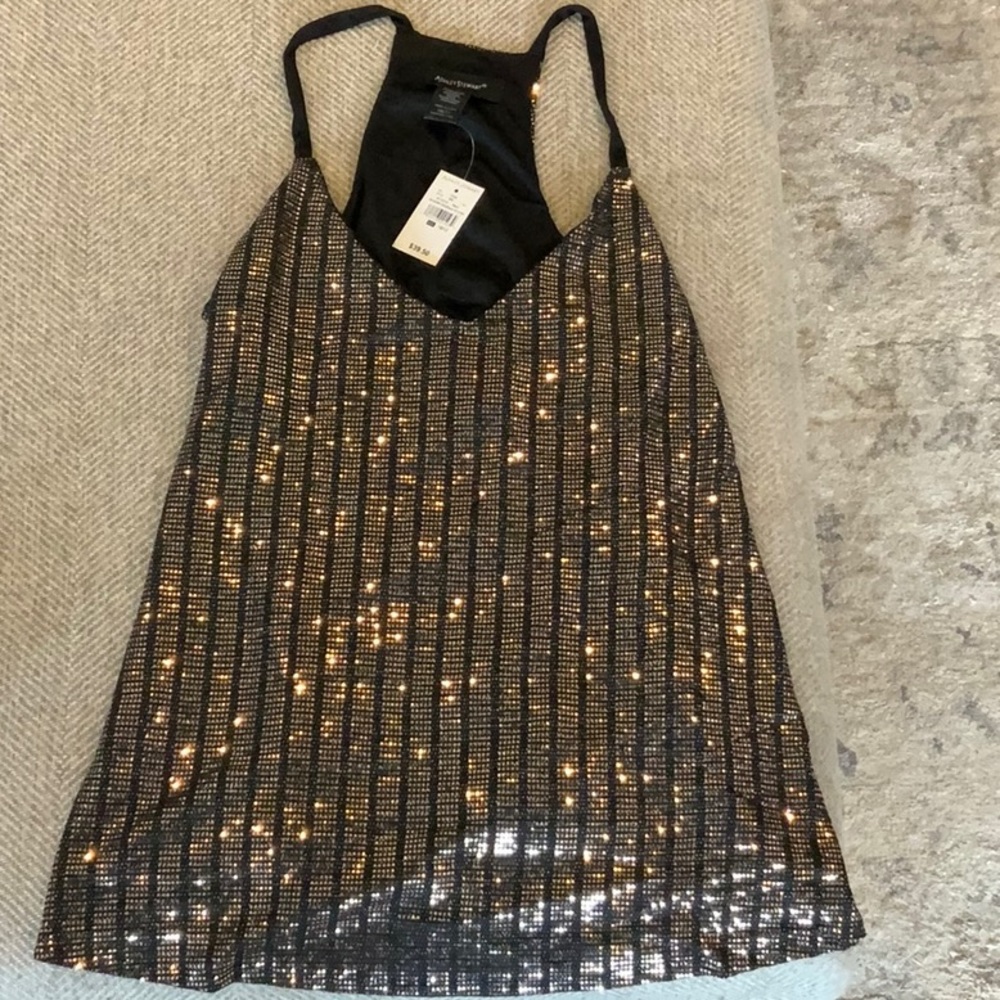 New with tags, great knit stretch fabric, Black base fabric with copper sequin